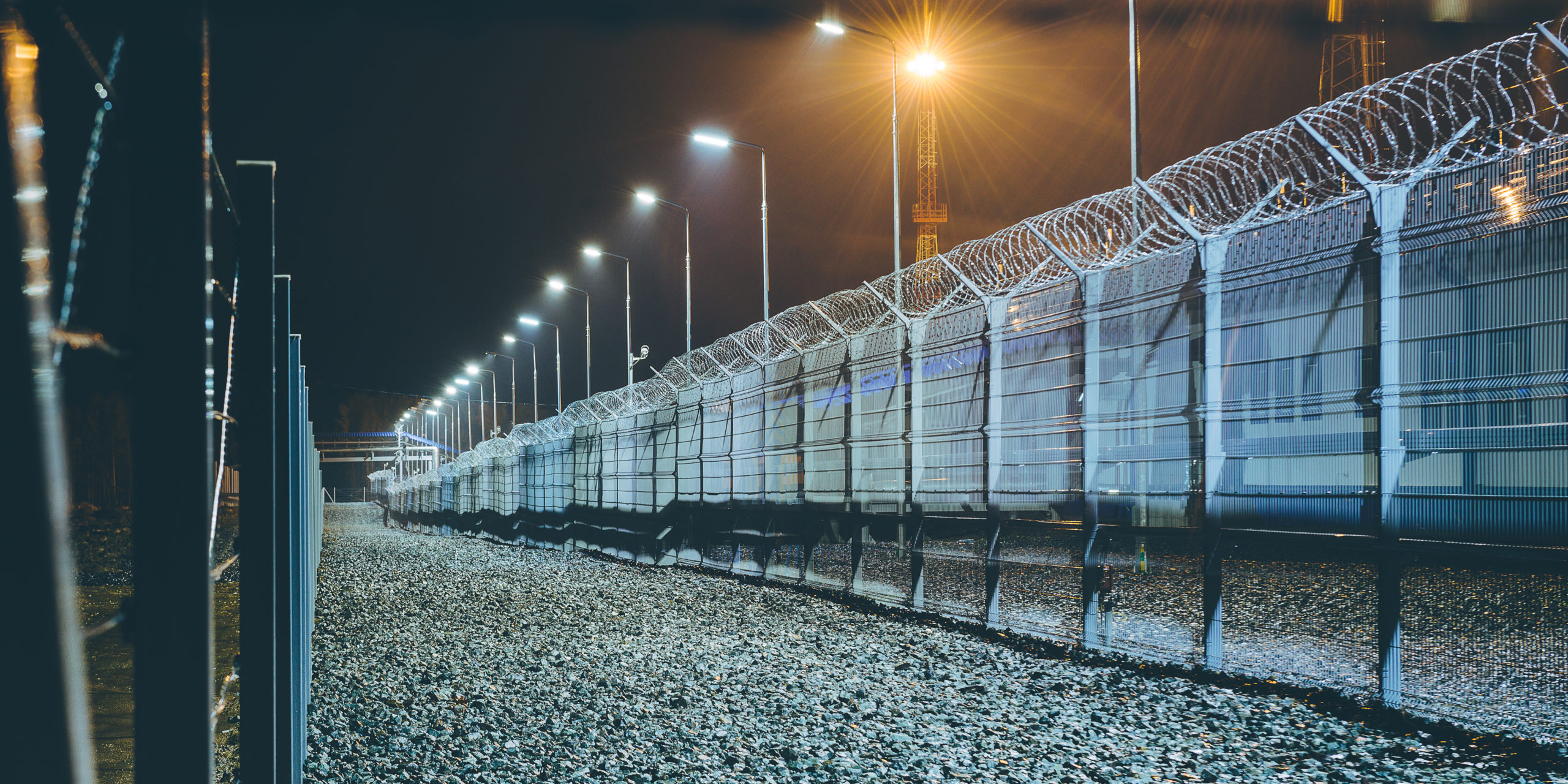 industrial fence at night